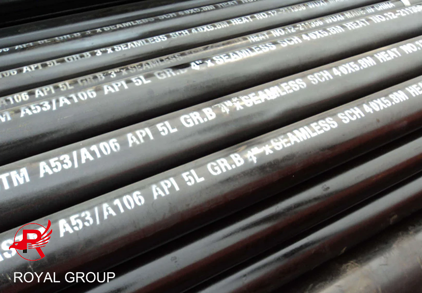 A pile of API 5L steel pipes are neatly placed together, with specific material models marked on the pipes, symbolizing high quality and reliability.